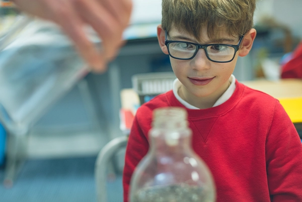 School pupil taking part in an experiment