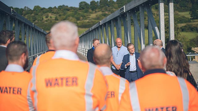 Wessex Water chief executive Colin Skellett speak during the ceremony to open the pedestrian footway across the River Avon